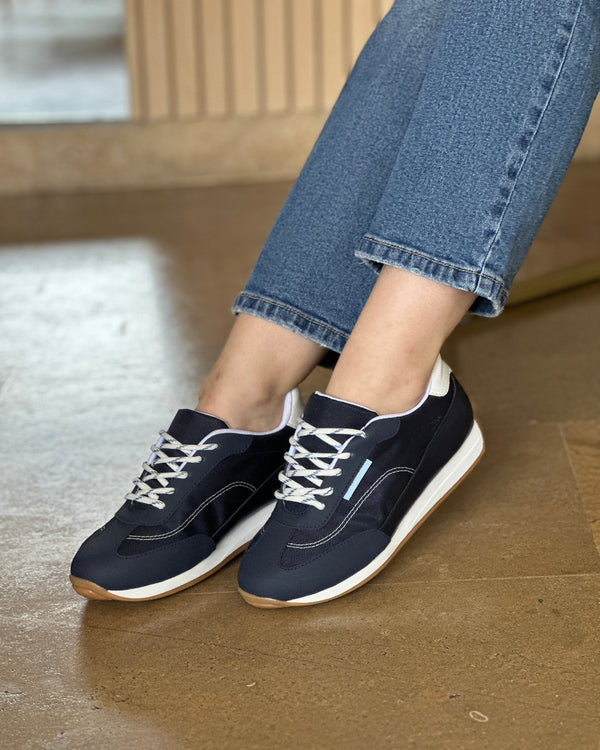 Tenis Naira